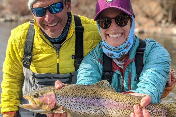 a person holding a fish